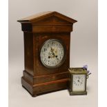 An Edwardian inlaid rosewood mantel clock and a carriage timepiece, tallest 36cm