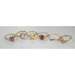 Five assorted modern 375 and gem set rings including amethyst and citrine, together with a 9ct