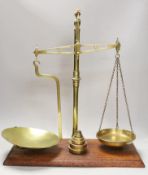 A set of Victorian brass balance scales and weights