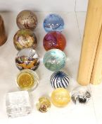 A selection of twelve various glass paperweights