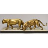 A French gilt metal ‘panther’ model group on a marble base, 56.5cm