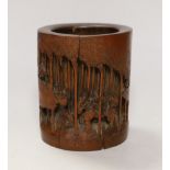 A Chinese 'bamboo' seven sages of the bamboo grove' brushpot, late 19th century, 14.5cm tall