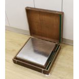 A stainless steel wedding cake stand, in original wooden box, marked C.W.S Bakery Division