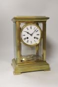 An early 20th century brass four glass mantel clock, 27cm