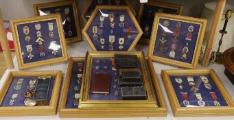 A collection of 20th century enamelled silver gilt or gilt metal Masonic medals with ribbons and