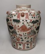 An Annamese enamelled porcelain ‘fish’ jar, 43cm high