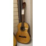 An acoustic guitar, labelled internally Peter Benjamin, Tunbridge ware maker, Barton House, 11