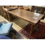 A rectangular oak refectory dining table, length 183cm, depth 87cm, height 76cm