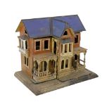 A Moritz Gottschalk ‘blue roof’ furnished dolls’ house, c.1893-94, modelled as an elaborate two