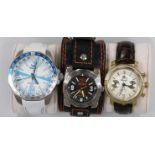 Three gentleman's modern stainless steel wrist watches including Vostok Europe and two other Russian