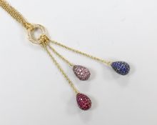 A modern 750 yellow metal, diamond chip and three colour gem pave set triple pear shaped drop