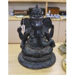 An Indian green patinated bronze model of Ganesha, on lotus base, 59cm