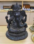 An Indian green patinated bronze model of Ganesha, on lotus base, 59cm