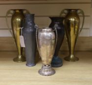 A Kayserzinn Art Nouveau pewter vase, a pair of brass vases, a plated vase and trench art vase
