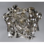 A Victorian part canteen of silver flatware by George Adams, comprising twelve table spoons,