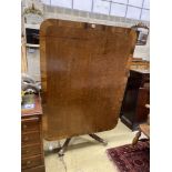 A Regency rosewood banded fiddle back mahogany rectangular tilt top dining table, width 138cm, depth