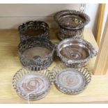 Two pairs of 19th century plated coasters, and two similar coasters