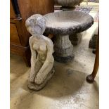 A circular reconstituted stone bird bath, diameter 48cm, height 42cm, together with a