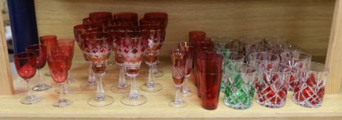 A set of ruby and green flashed glasses, tallest 18cm