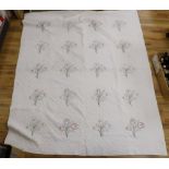 A 1920's American friendship dowry quilt embroidered with flowers, initialled