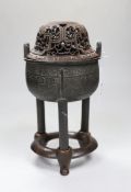 A Chinese late Ming bronze censer, ding, with hongmu cover and stand, 24.5cm highPurchased in 1965