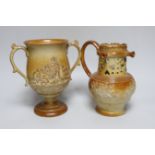 A Brampton salt glazed stoneware puzzle jug and a similar two handled loving cup, c.1840, tallest
