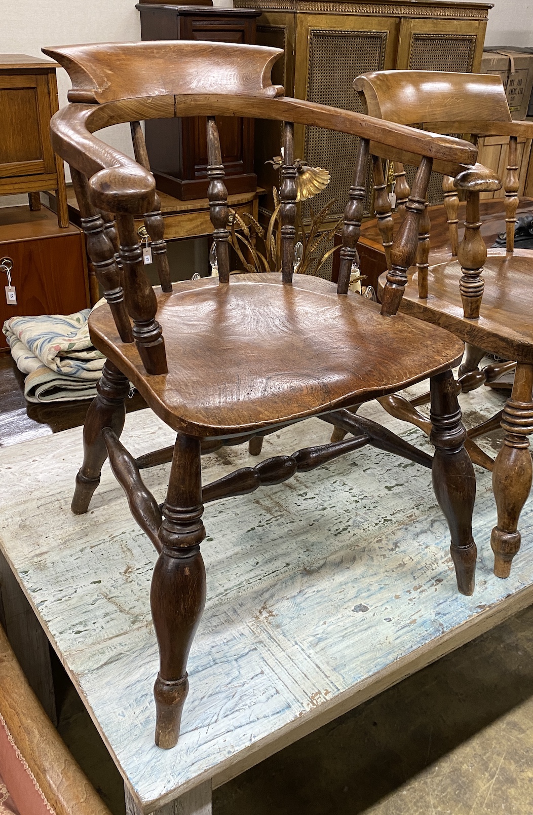 A Victorian elm and beech smoker's bow elbow chair, width 60cm, depth 49cm, height 84cm