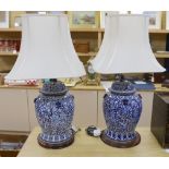 A pair of Chinese blue and white lamp bases