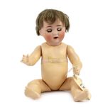 A Schutzmeister & Quendt bisque character doll, German, circa 1920, impressed 201, entwined SQ 6,