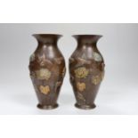 A pair of Japanese bronze and mixed metal vases, Meiji period, 16cm tall