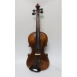 A 19th century cased violin, back measures 36cm excl button