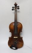 A 19th century cased violin, back measures 36cm excl button