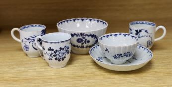 A Liverpool tea bowl and saucer painted with trailing flowers, the saucer with an additional central