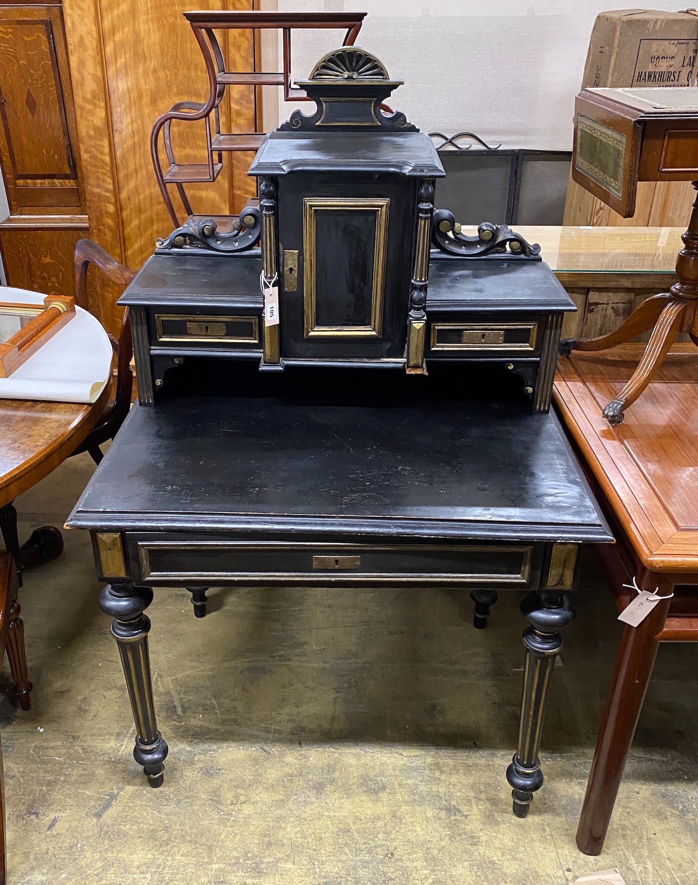 A late 19th century French gilt metal mounted ebonised desk, width 90cm, depth 70cm, height 142cm