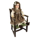 A German bisque doll, impressed W&S, 125-10, weighted glass eyes and open mouth, jointed wood and