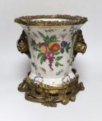 A brass mounted porcelain vase, 27cm