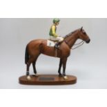 A Beswick model of a jockey and horse. ‘Nijinski, Lester Piggott up, 1970 winner of the English