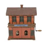 ‘To The Golden Goose’: A rare German musical toy modelled as two storey half-timbered building,