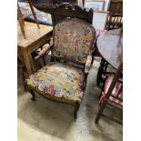 A French tapestry upholstered elbow chair, width 65cm, depth 60cm, height 93cm