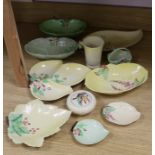 A collection of Carlton Ware leaf moulded dishes, a cup and a preserve pot and cover