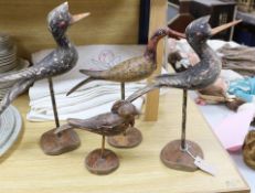 Four various wooden folk art wild birds. Tallest 43cm