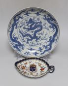 A Chinese blue and white ‘dragon’ dish, marked to base, 28cm diameter, together with a Samson blue