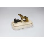 A 19th century group of two bronze dogs on a mounted marble base, 8.5cm tall