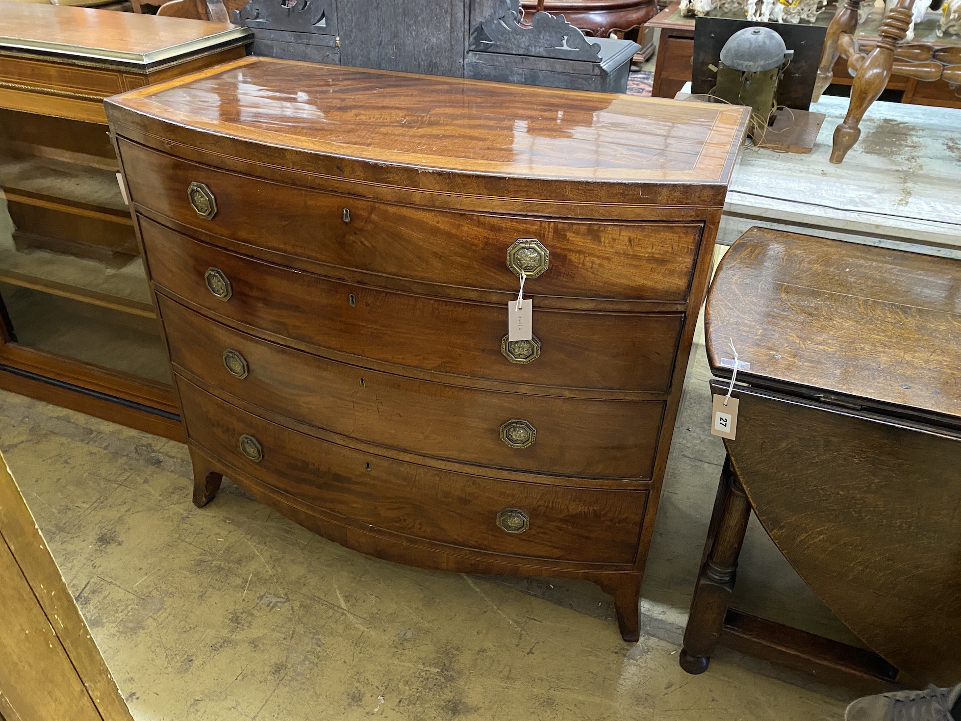 A Regency satinwood banded mahogany bowfront chest of drawers, width 106m, depth 53cm, height 96cm