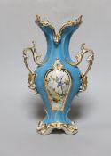 A Coalport rococo two handled vase, painted with birds, probably by John Randall, on a turquoise