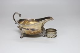 A 1930's silver sauceboat and a napkin ring, 5.6oz.