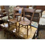 A harlequin set of seven Victorian elm and beech Windsor chairs, (one with arms)