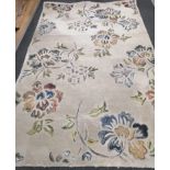 A mid century Indian decorative cream ground carpet, 244 x 154cm