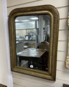 A 19th century French giltwood and composition wall mirror, width 56cm, height 76cm
