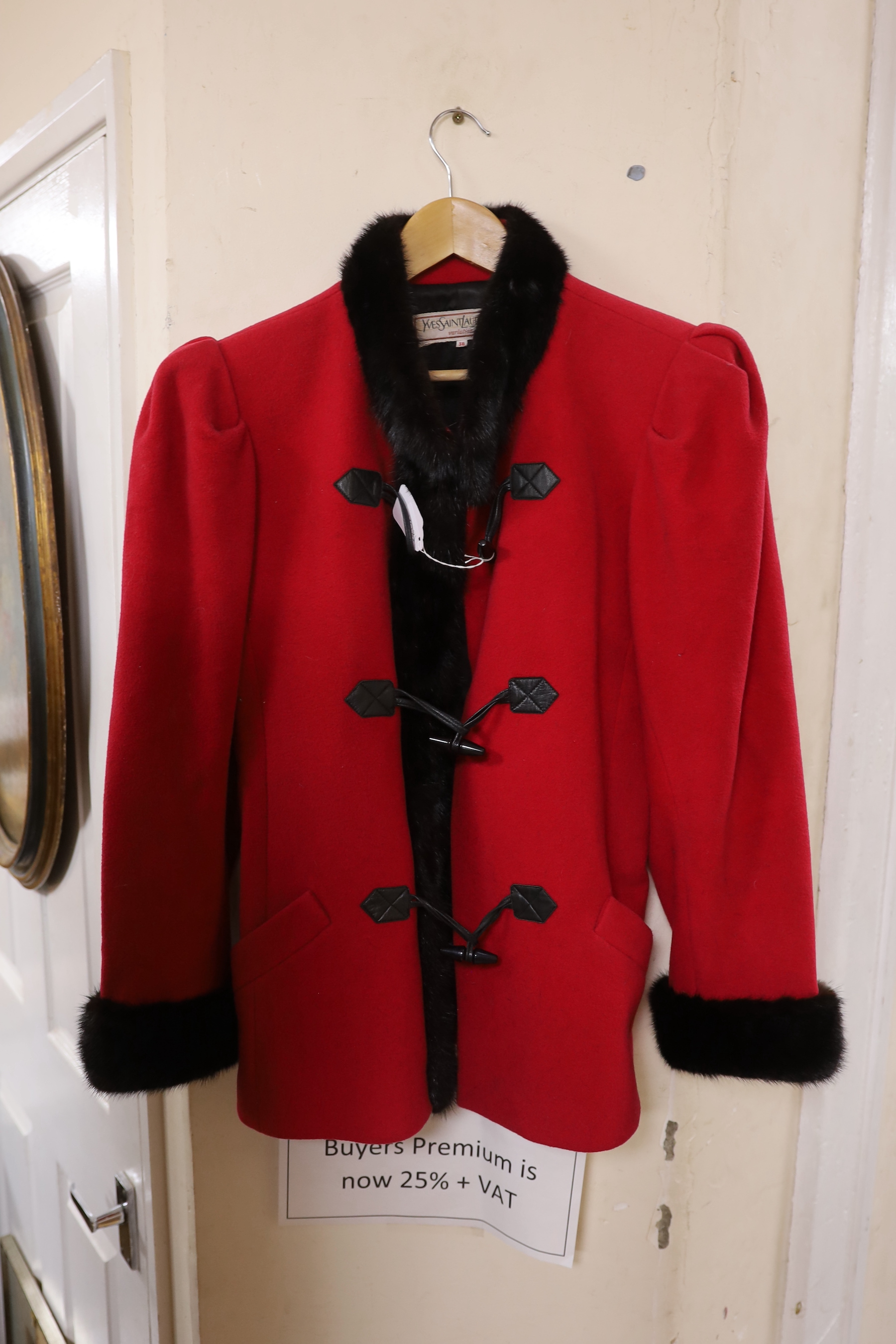 An Yves Saint Laurent ‘variation’, 1980's red wool jacket trimmed with black mink and leather toggle